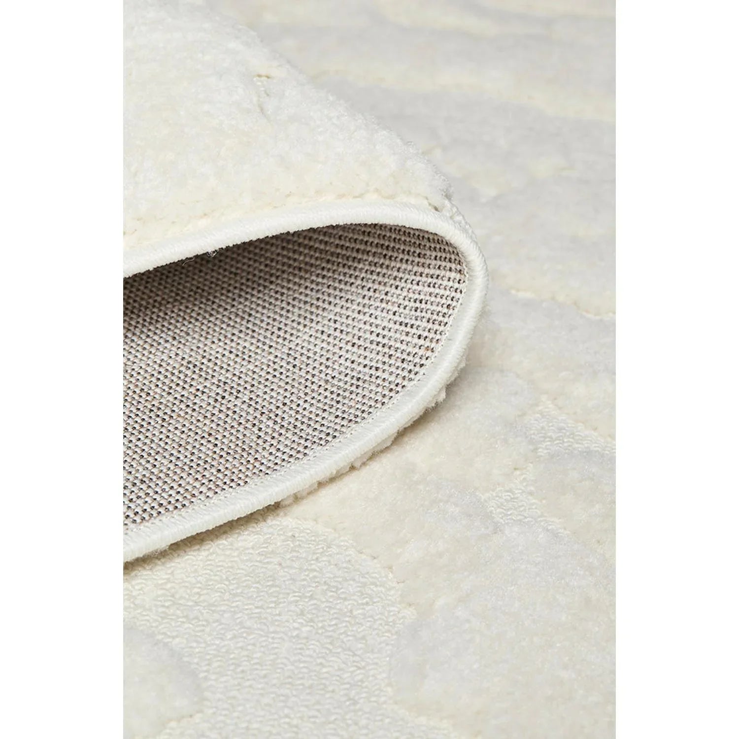 Haven Nyla White Rug featuring ivory cream tufted pattern on light beige, machine-made rug by Rug Culture