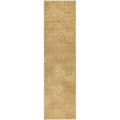 Beige textured patterned rug on a white background