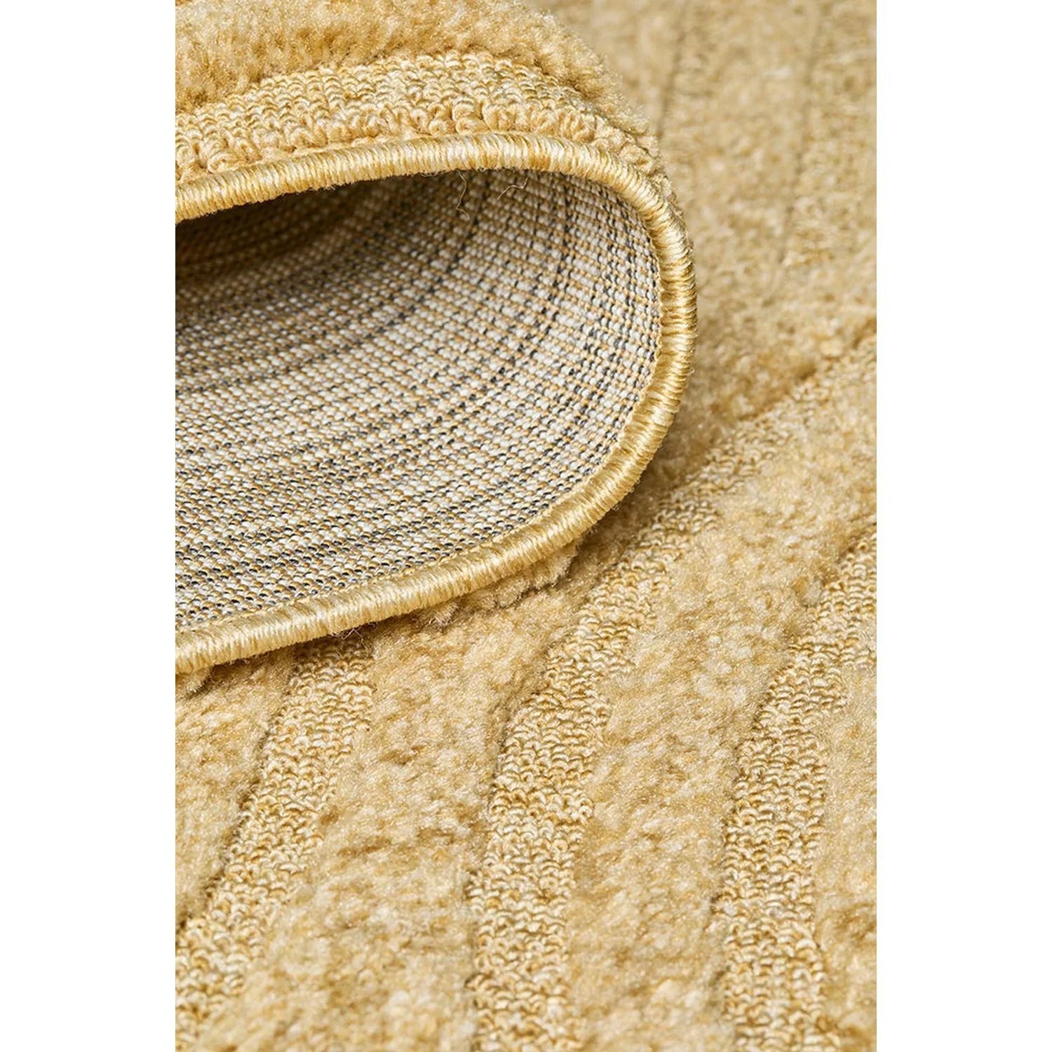 Haven Zina Gold Runner Rug featuring textured striped pattern in rich gold, cream and beige on warm gold background, machine-made wool