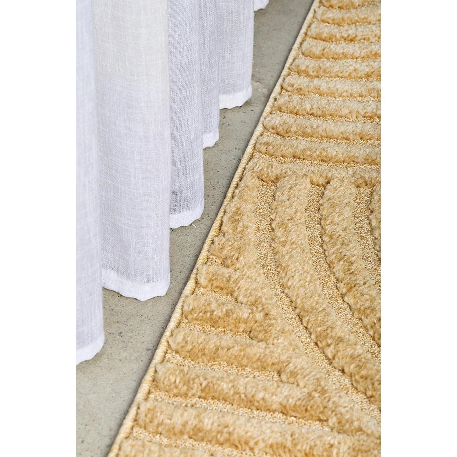 Haven Zina Gold Rug featuring textured geometric pattern in gold, cream and beige on beige background, hand-tufted wool