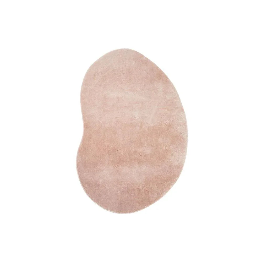 Jelly Bean Rose Rug featuring solid plush oval design in blush pink on white background, hand-tufted polyester