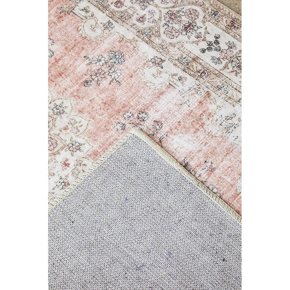 Kindred Coco Peach Runner featuring distressed floral border in peach, ivory and blush on ivory background, machine-woven wool