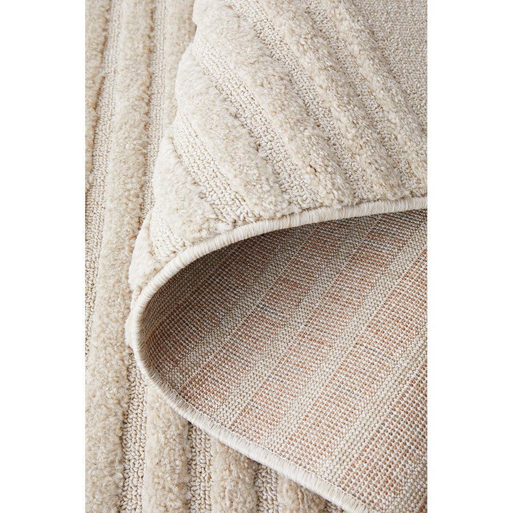 Lotus Abbey Beige Rug featuring textured looped-pile pattern in cream, beige and taupe on neutral background, hand-tufted wool