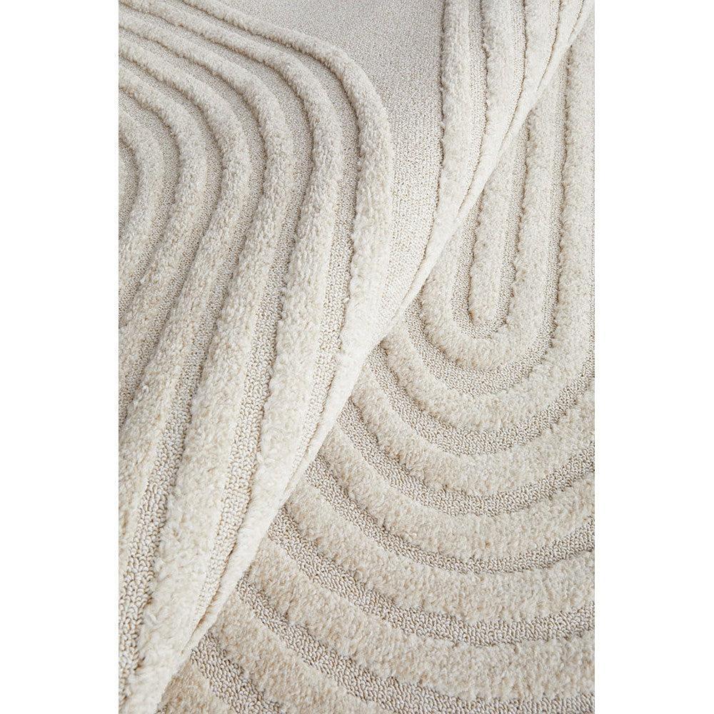 Lotus Abbey Beige Rug by Rug Culture featuring concentric curved stripe texture in beige and ivory on cream background