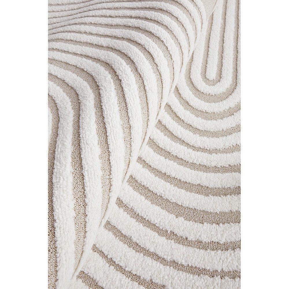 Lotus Abbey Mixed Rug featuring circular stripe pattern in ivory, cream and taupe on white background, hand-tufted wool