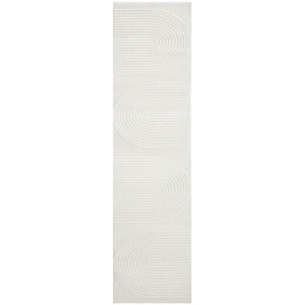 Lotus Abbey White Runner Rug featuring concentric circular pattern in ivory on white background, hand-tufted wool