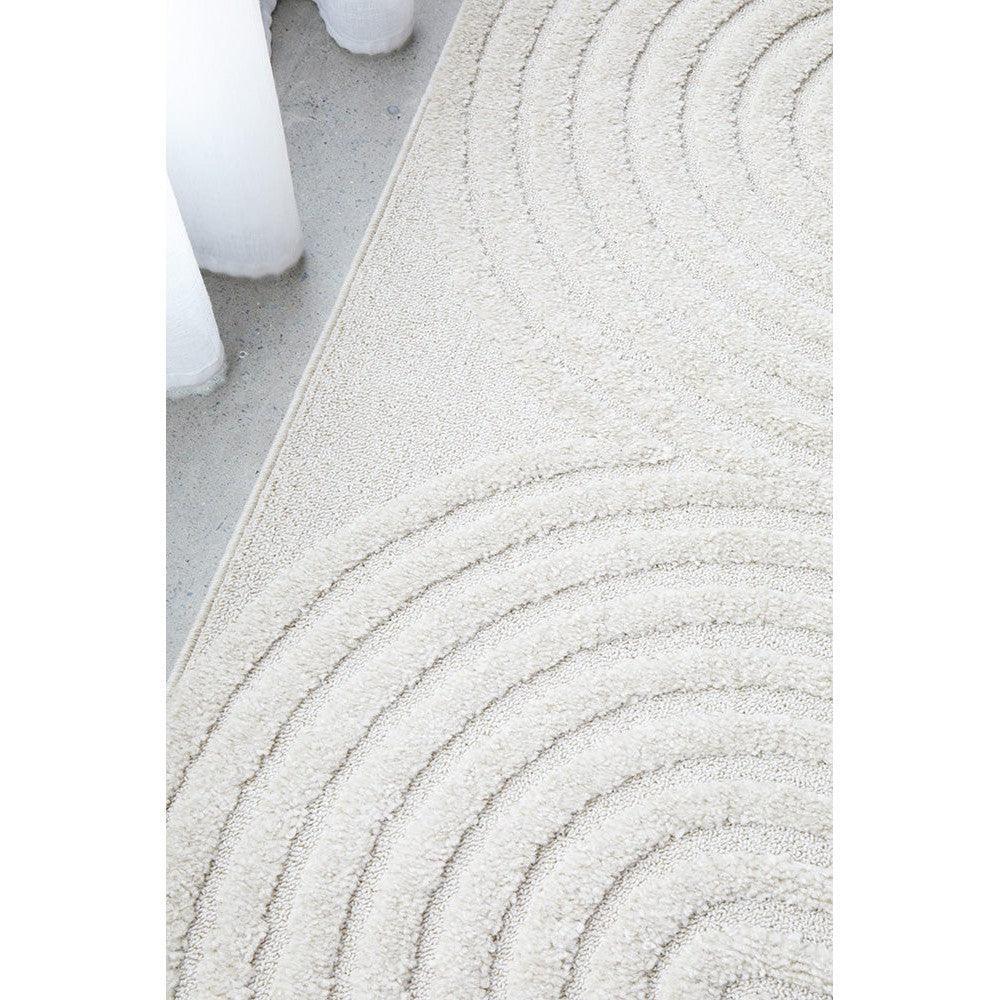 Lotus Abbey White Rug featuring spiral concentric pattern in ivory, cream and beige on ivory background, hand-tufted wool