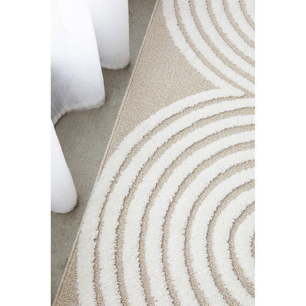 Lotus Carl Mixed Rug featuring concentric spiral pattern in beige, ivory on light beige background, hand-tufted wool