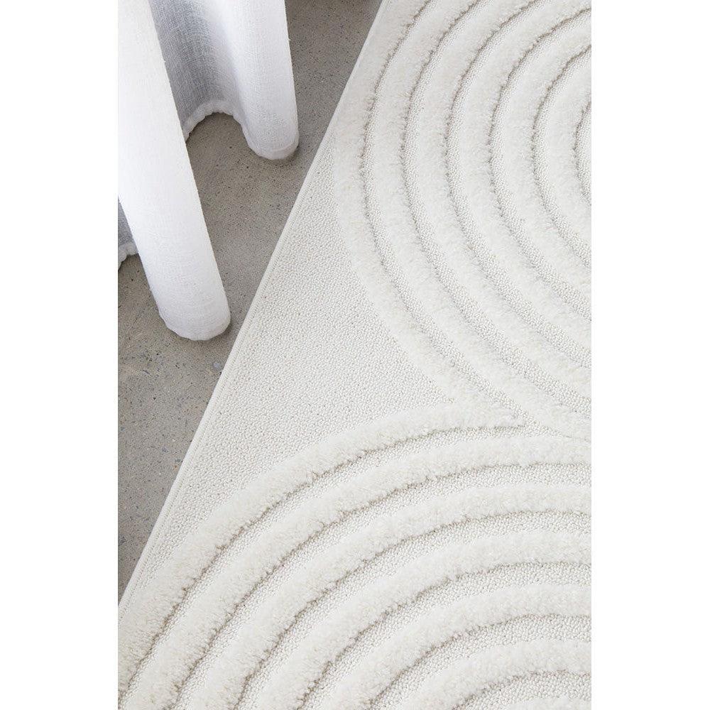 Lotus Carl White Runner Rug featuring concentric circle pattern in ivory and cream on white background, hand-tufted wool