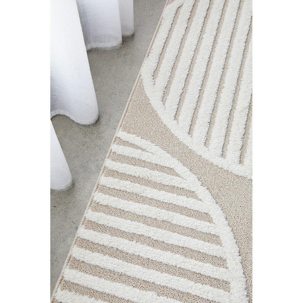 Lotus Leo Mixed Rug from Rug Culture featuring diagonal stripes and curved motif in cream, taupe and beige on light beige background, hand-tufted wool