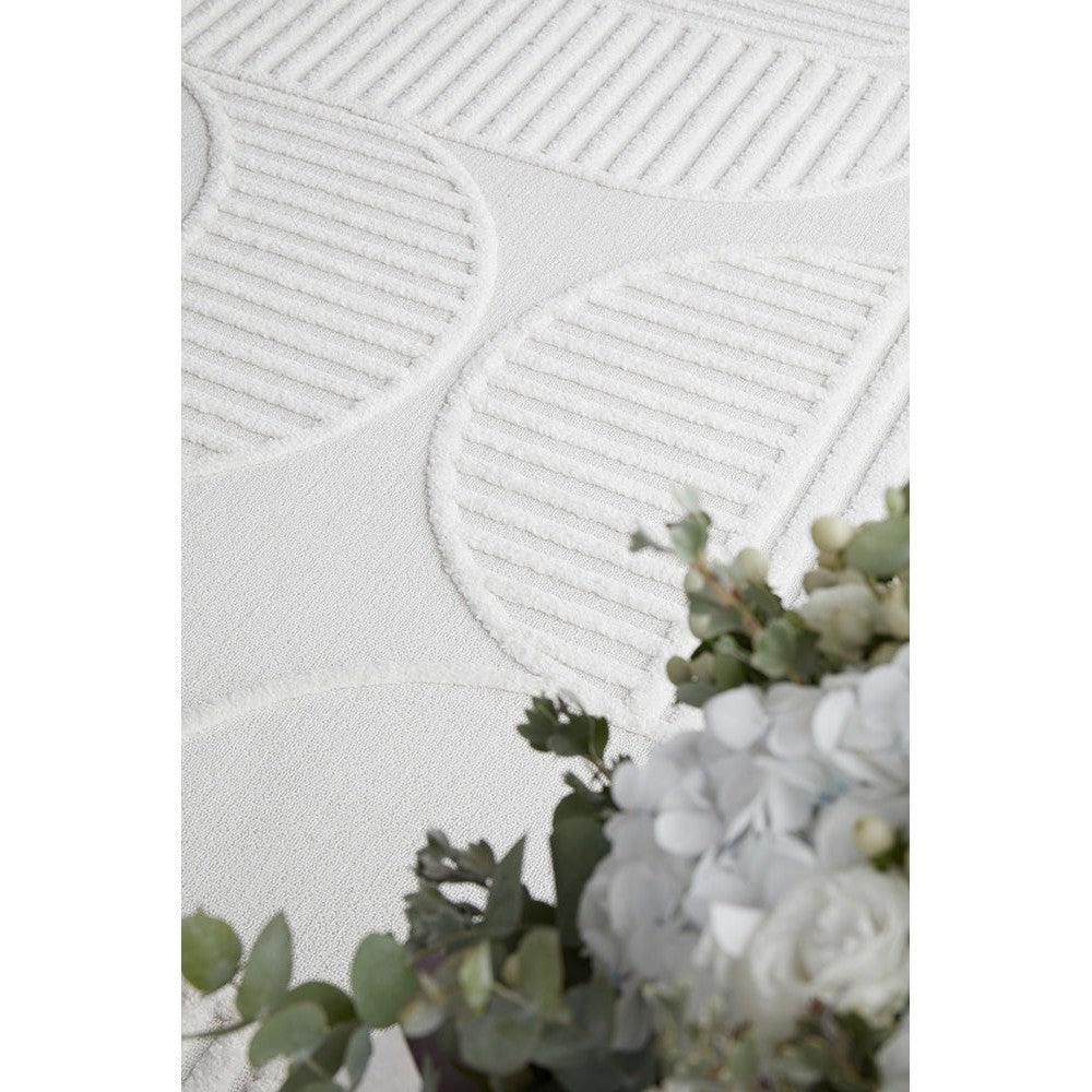 Lotus Leo White Runner Rug featuring circular geometric pattern in ivory and white on white background, machine-loomed wool