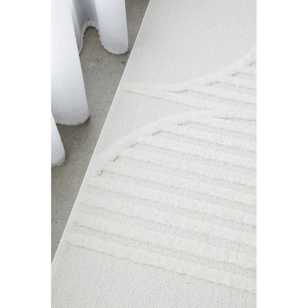 Lotus Leo White Rug featuring linear striped pattern in white and ivory on soft beige background, hand-tufted wool