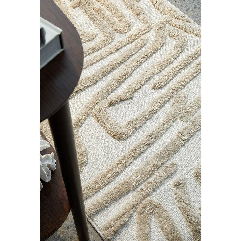 Marigold Jayla Abstract Art Beige Rug featuring raised beige-tan pattern on cream background, machine-woven polyester