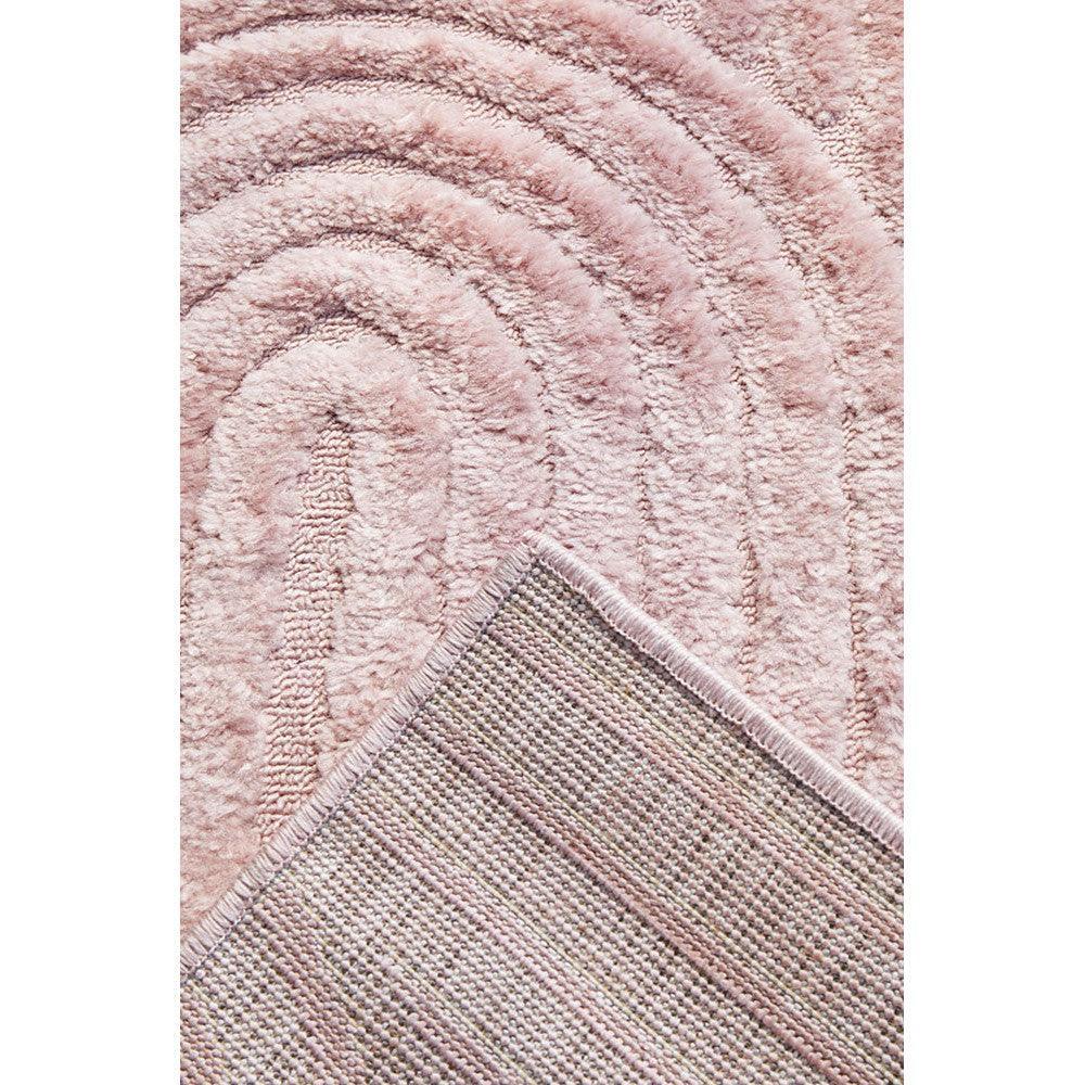 Marigold Jooji Curve Abstract Pink Rug featuring spiral pattern in blush pink, dusty pink, cream on pale pink background, hand-tufted wool