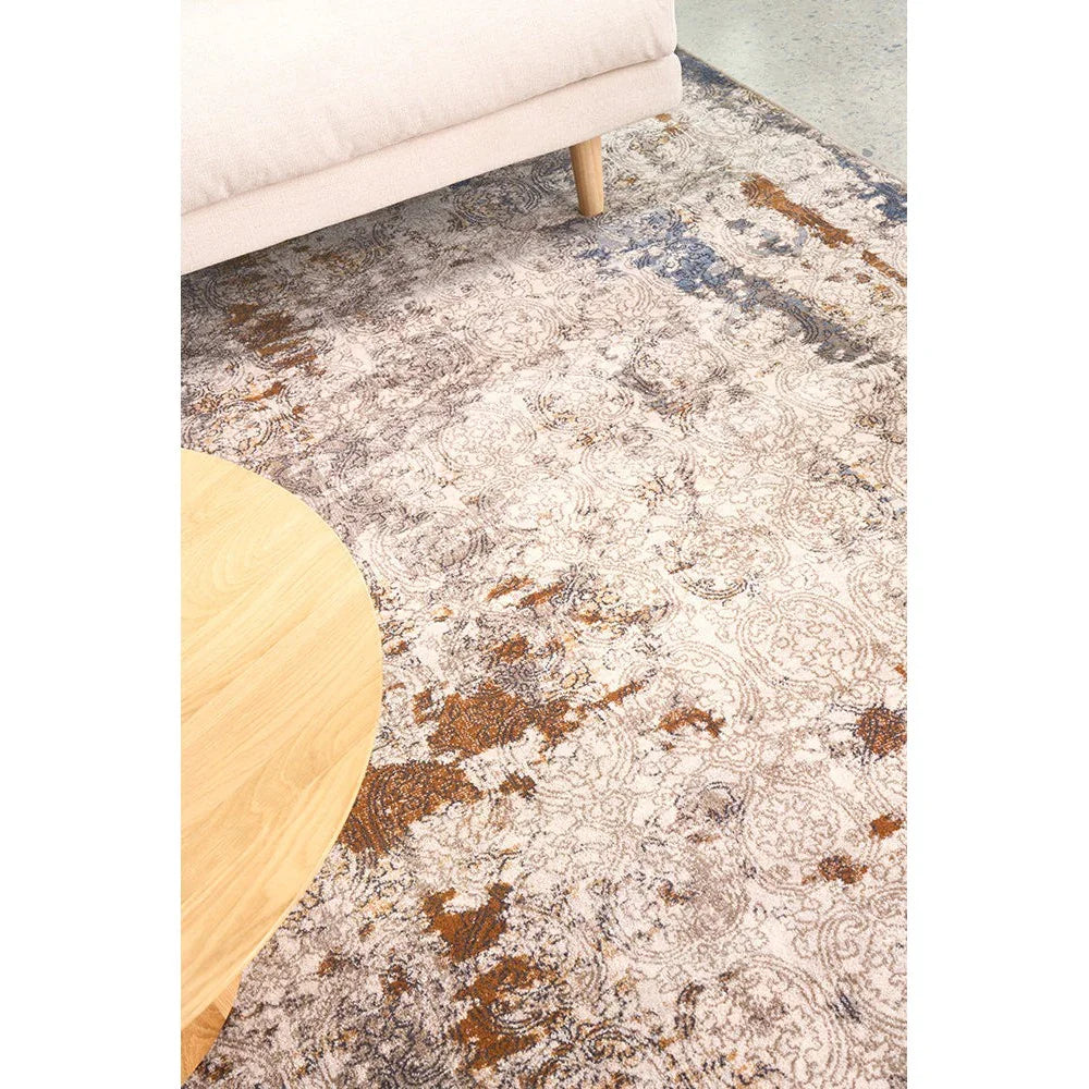 Melody Gayle Multi Rug featuring ornate floral pattern in cream, beige, rust, navy and grey on ivory background, machine-woven polyester blend