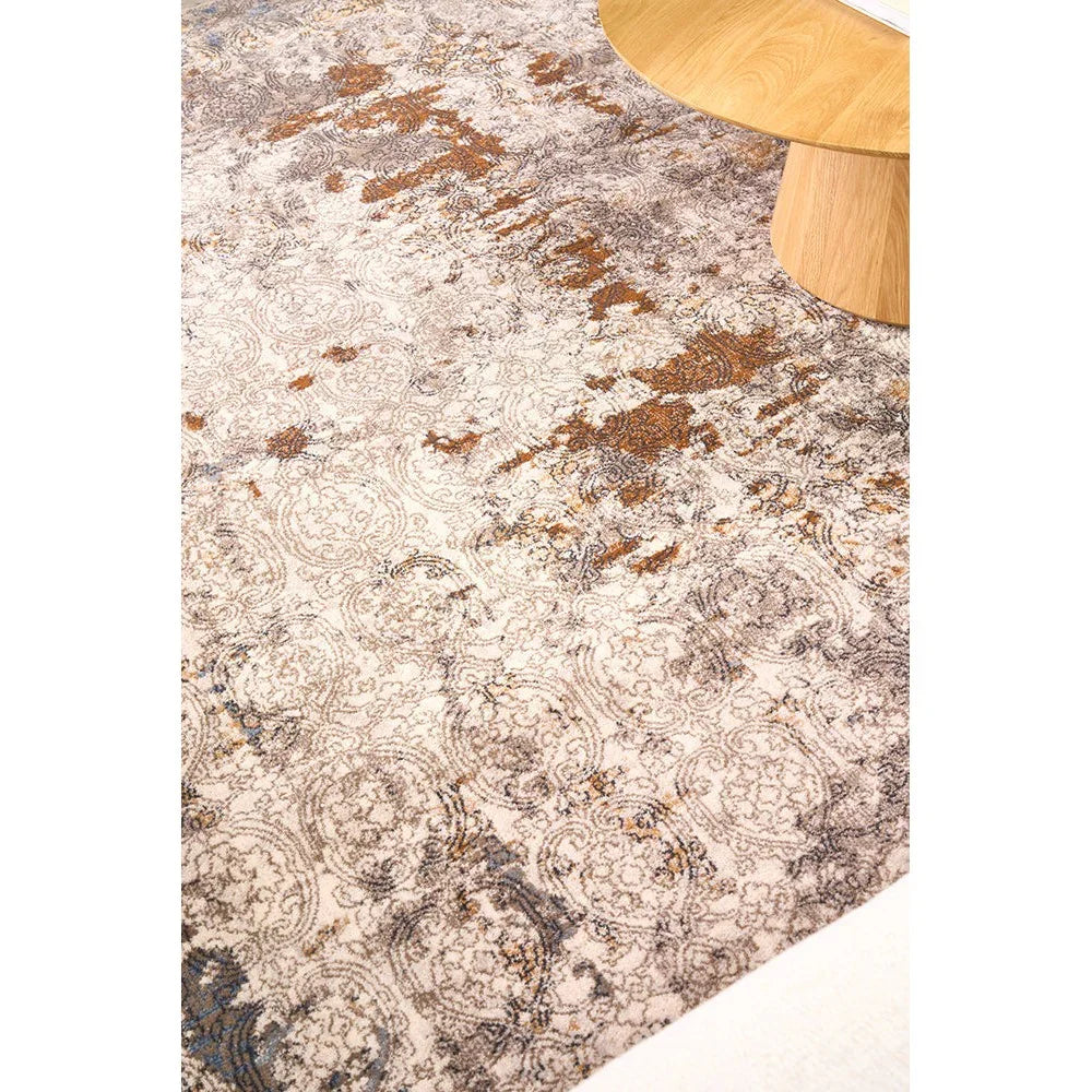 Melody Gayle Multi Rug featuring distressed damask pattern in cream, taupe, rust brown and navy on beige background, machine-woven polyester
