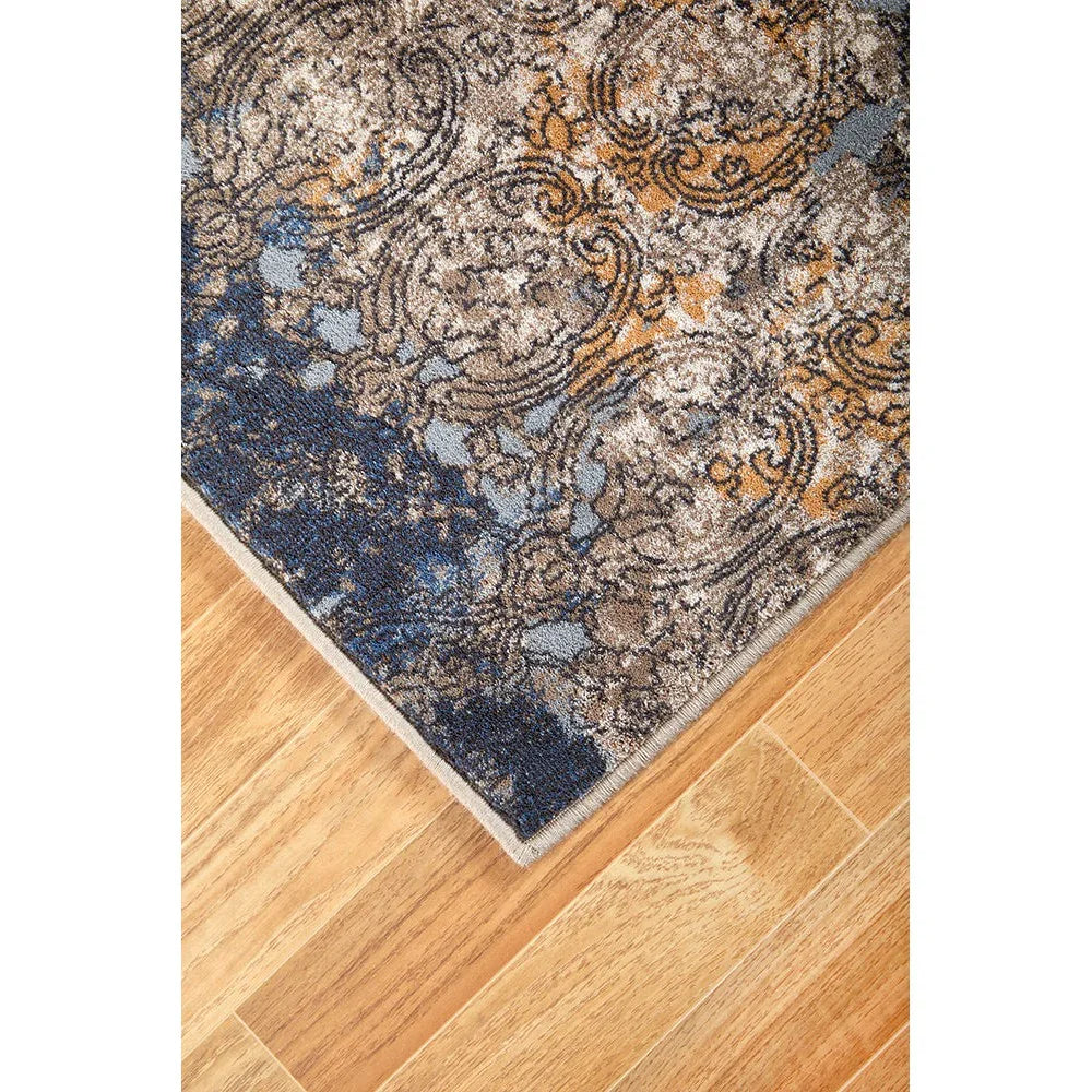 Melody Gayle Multi Rug featuring ornate floral pattern in navy blue, sky blue, beige and rust on cream background, machine-made polypropylene