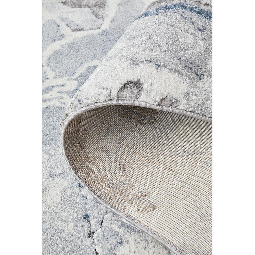 Geode Blue Runner Rug featuring mineral pattern in pale blue, ivory and grey on light grey background, hand-tufted wool