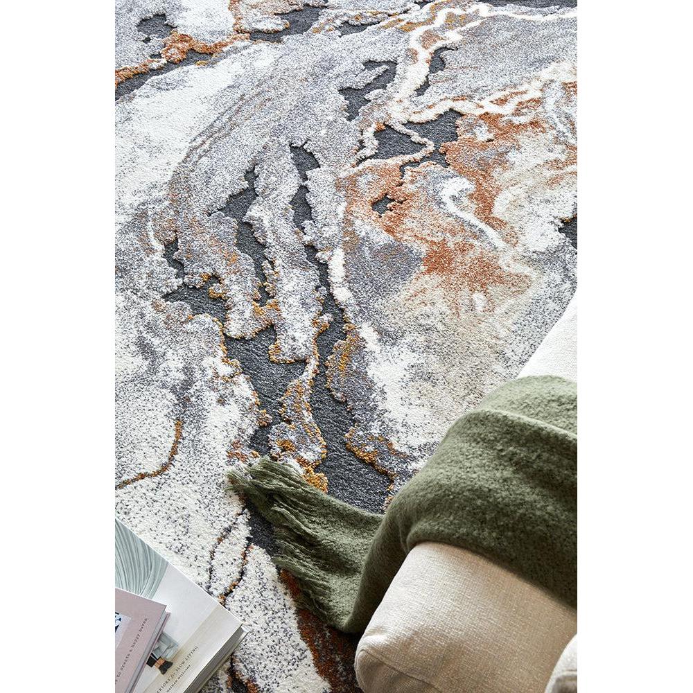 Textured area rug with abstract pattern on a white background