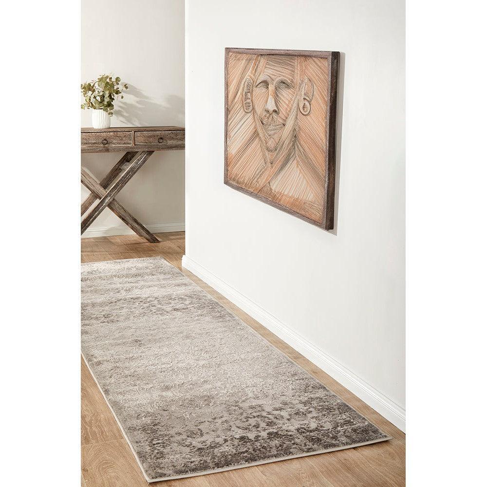 Lux Lucy Silver Runner Rug featuring subtle distressed pattern in silver, ivory and charcoal on light grey background, machine-woven polyester