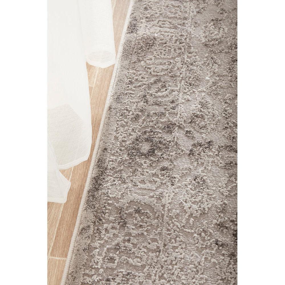 Lux Lucy Silver Runner Rug featuring distressed floral pattern in silver and grey on light taupe-beige background, machine-made polypropylene