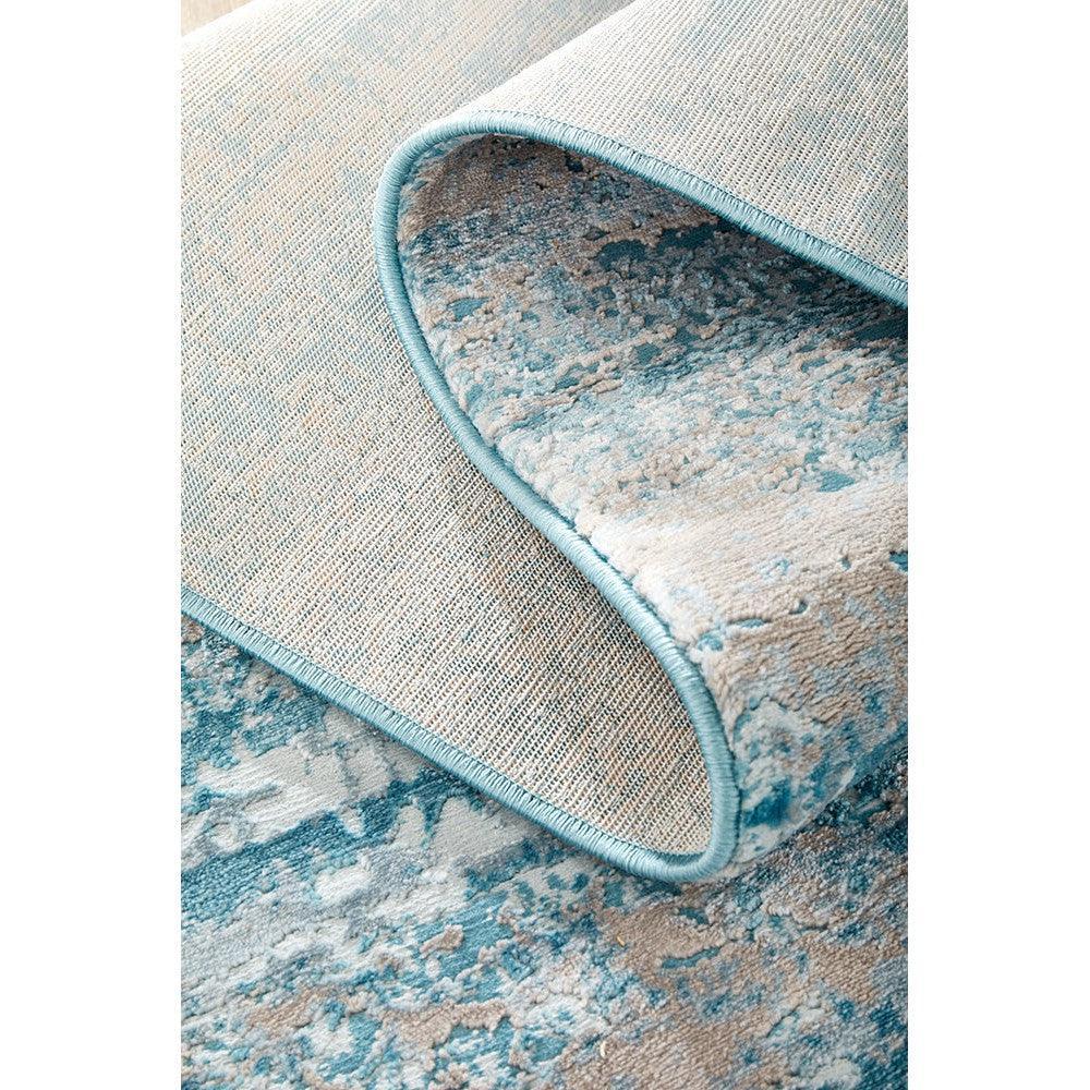 Lux Olivia Blue Runner Rug featuring abstract teal and sky blue pattern on cream background, hand-tufted wool