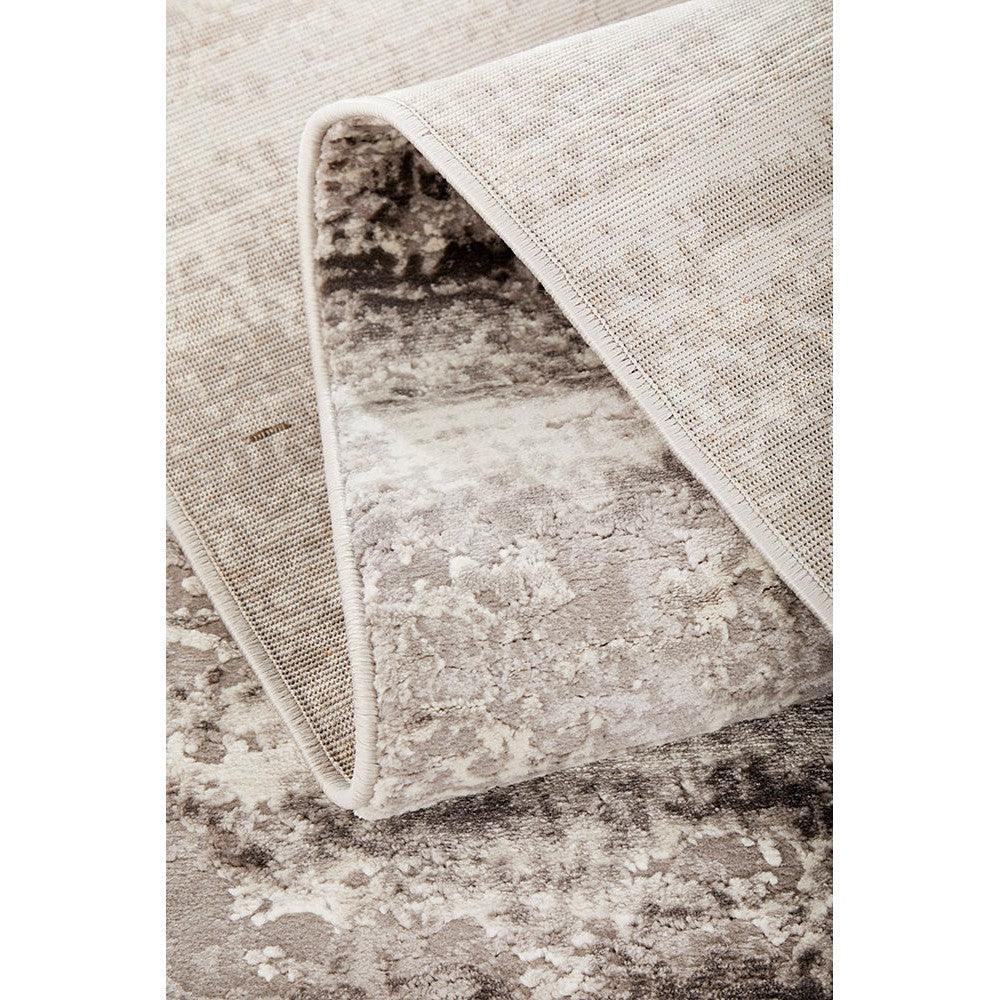 Lux Sophia Silver Runner Rug featuring distressed abstract pattern in silver, charcoal and cream on silver base, woven