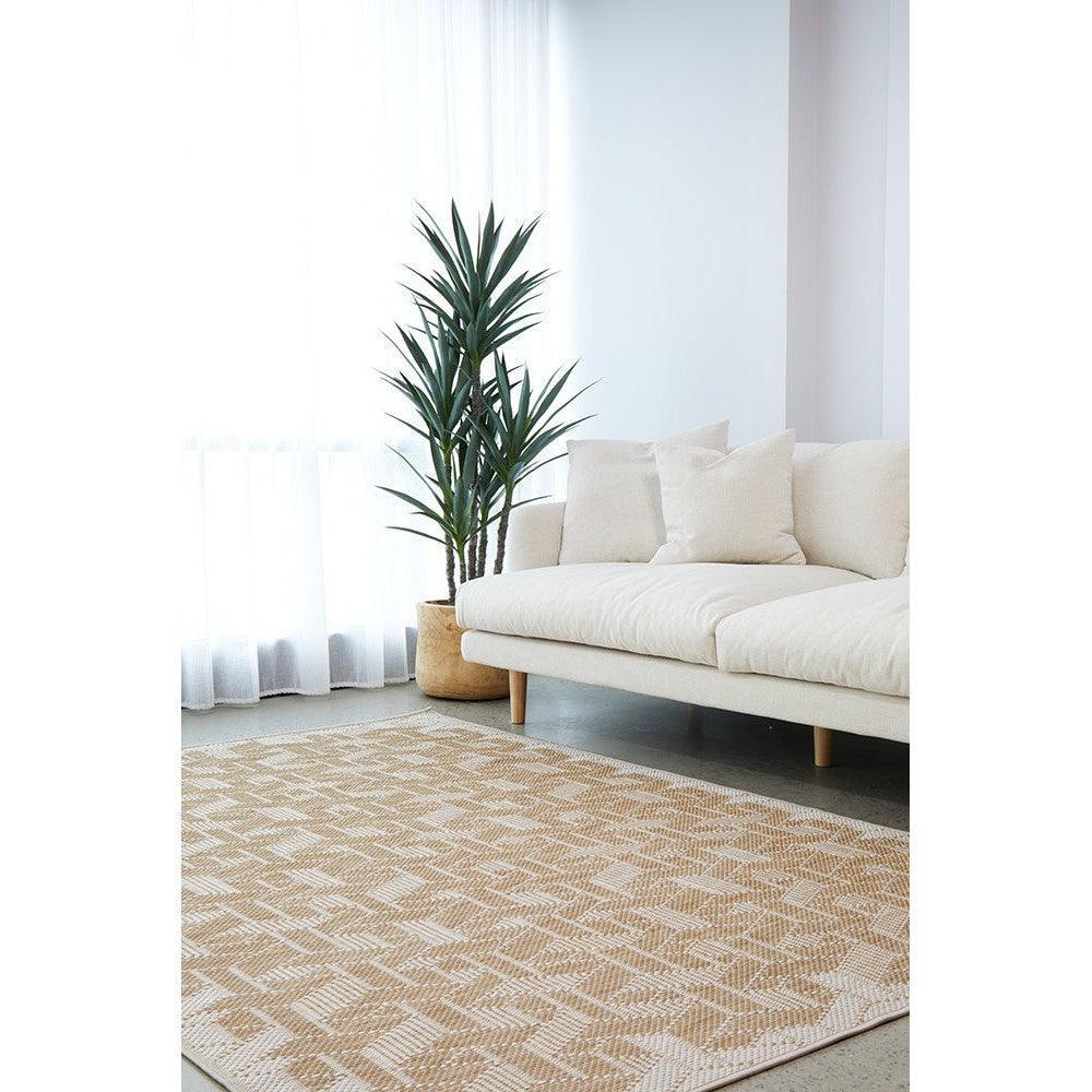 Patio Kudo Natural Indoor-Outdoor Rug with geometric diamond pattern in beige on light background, flatwoven polypropylene