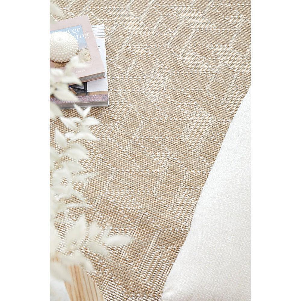 Patio Kudo Natural Indoor-Outdoor Rug featuring plaid geometric pattern in beige, taupe and cream on light background, power-loomed polypropylene