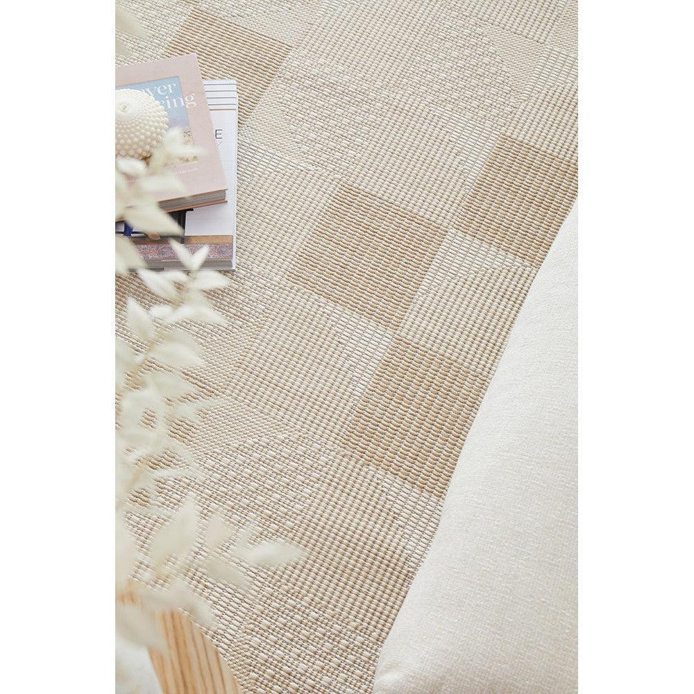 Patio Selin Natural Indoor-Outdoor Rug featuring woven block pattern in beige, cream and taupe on natural background, hand-woven jute