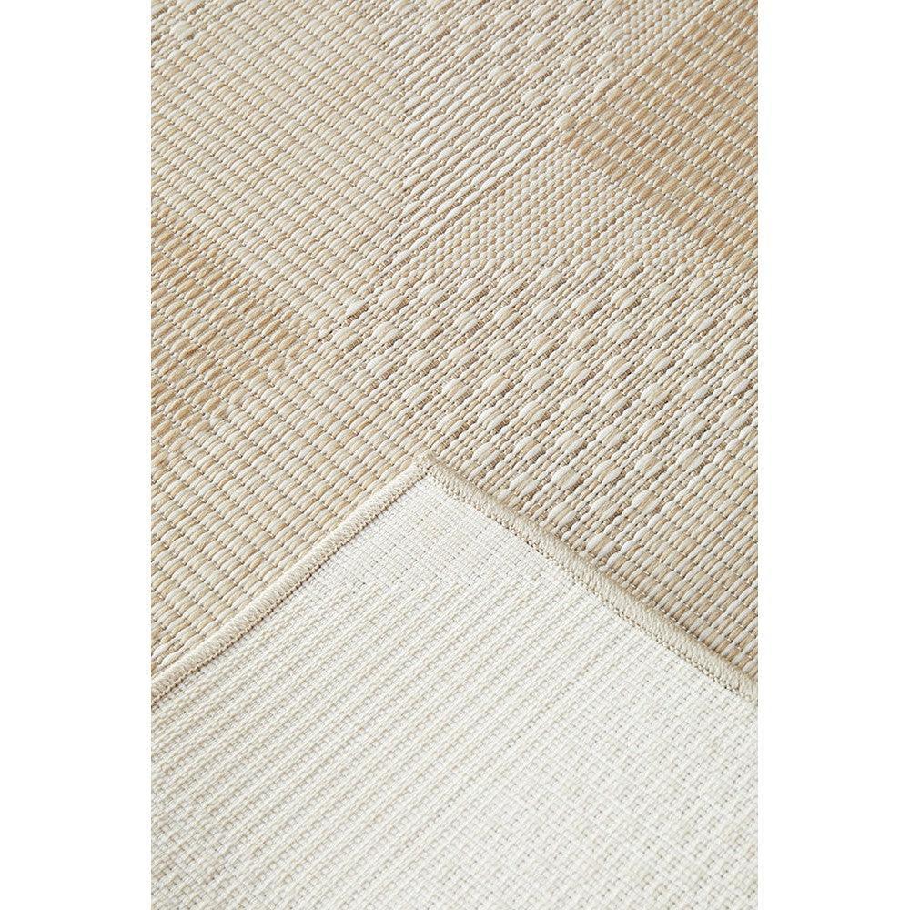 Patio Selin Natural Indoor-Outdoor Rug featuring two-tone patchwork in cream, beige and tan on ivory, machine-woven polypropylene