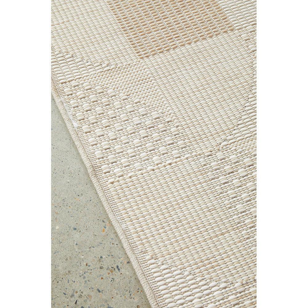 Patio Selin Natural Indoor-Outdoor Rug featuring textured woven stripes in cream, beige and taupe on natural backdrop