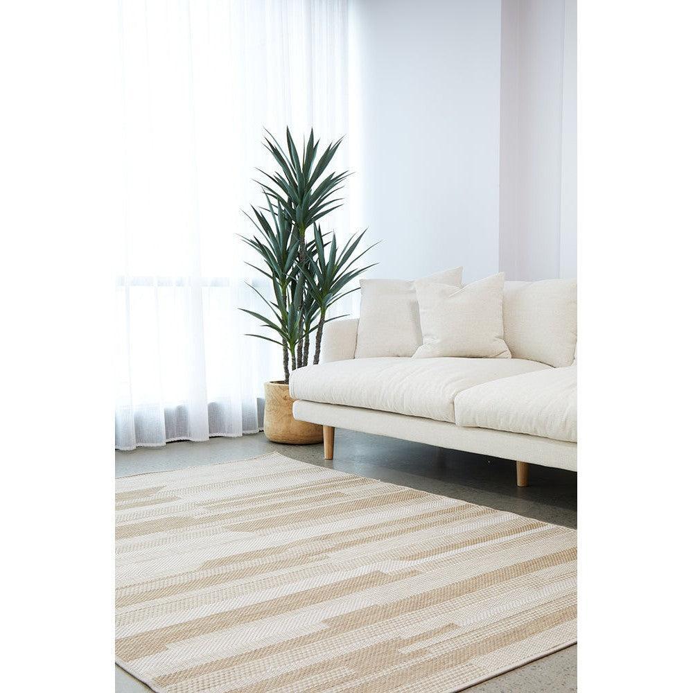 Patio Tilda Natural Indoor-Outdoor Rug featuring striped pattern in beige and cream on light grey floor, machine-made synthetic fibre