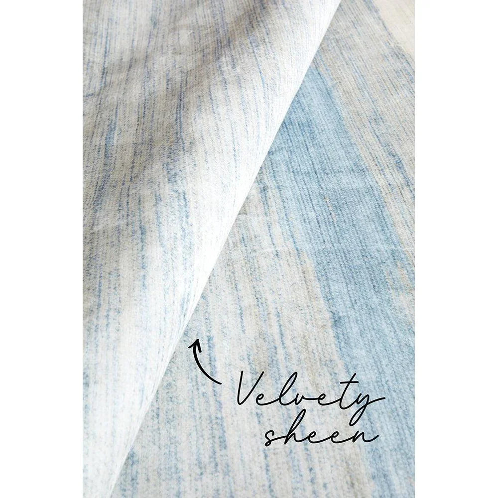 Revive Brody Washable Rug featuring velvet-sheen striped pattern in sky blue and cream on pale background, machine-woven polyester
