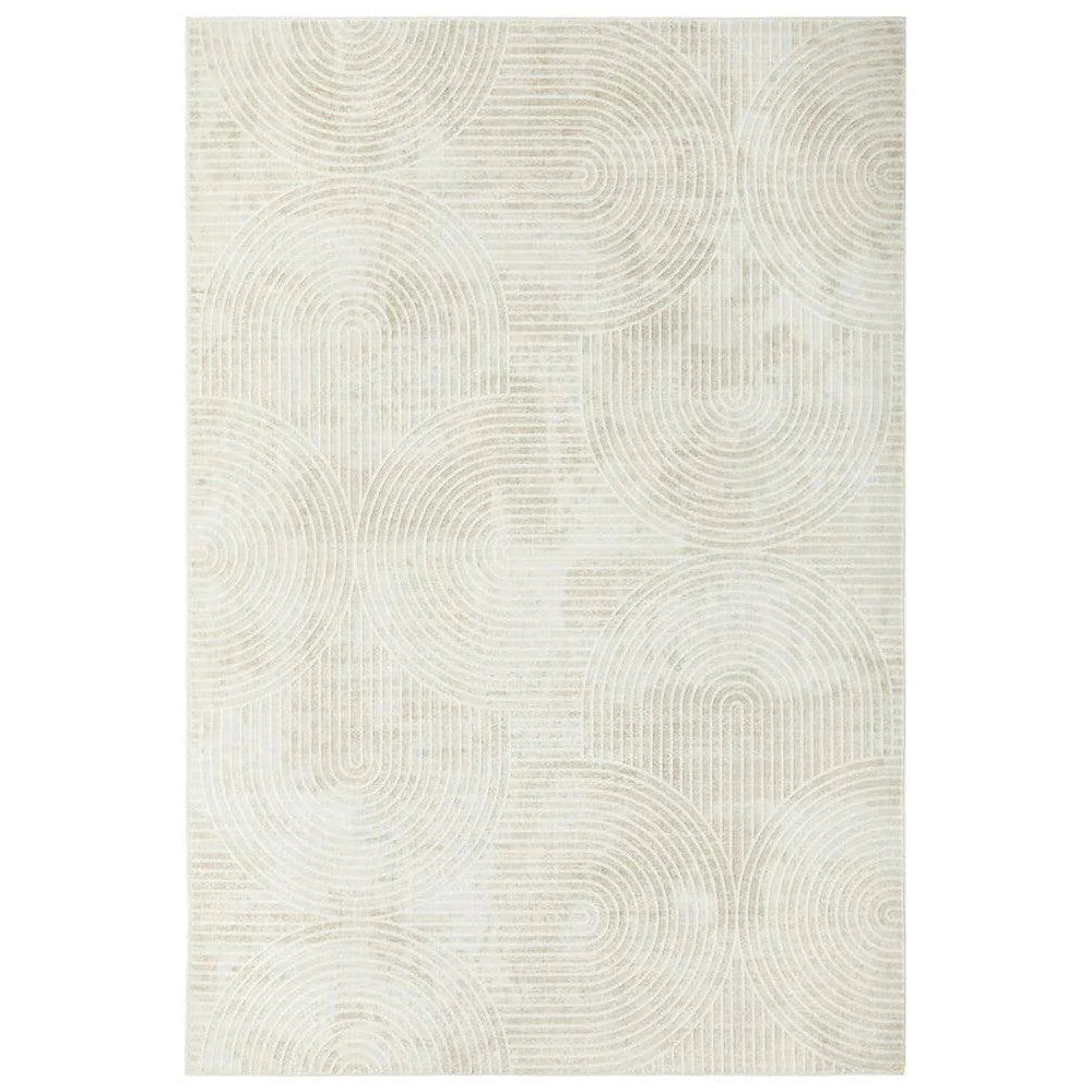 Revive Byron Natural Washable Rug featuring circular geometric pattern in cream and ivory on pale beige background, machine-made polyester blend