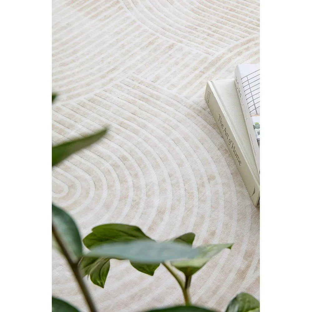 Revive Byron Natural Washable Rug featuring circular motif in cream and beige on ivory background, machine-made cotton