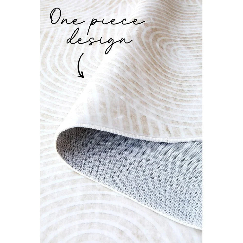 Revive Byron Natural Washable Rug featuring ripple ring pattern in ivory, beige and taupe on pale cream background, machine-woven polypropylene
