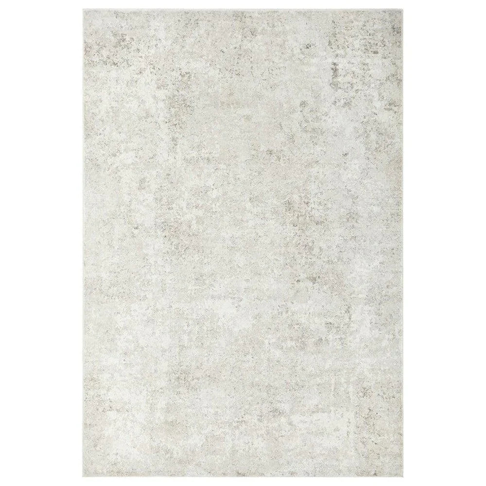 Revive Isla Marble Washable Rug featuring marble distressed pattern in pale ivory and light grey on white, machine-washable polyester