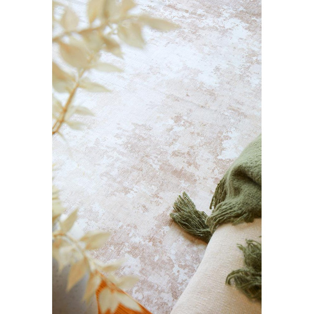 Revive Kacie Natural Washable Rug featuring distressed textured pattern in cream, beige and pale pink on ivory background, machine-woven polyester