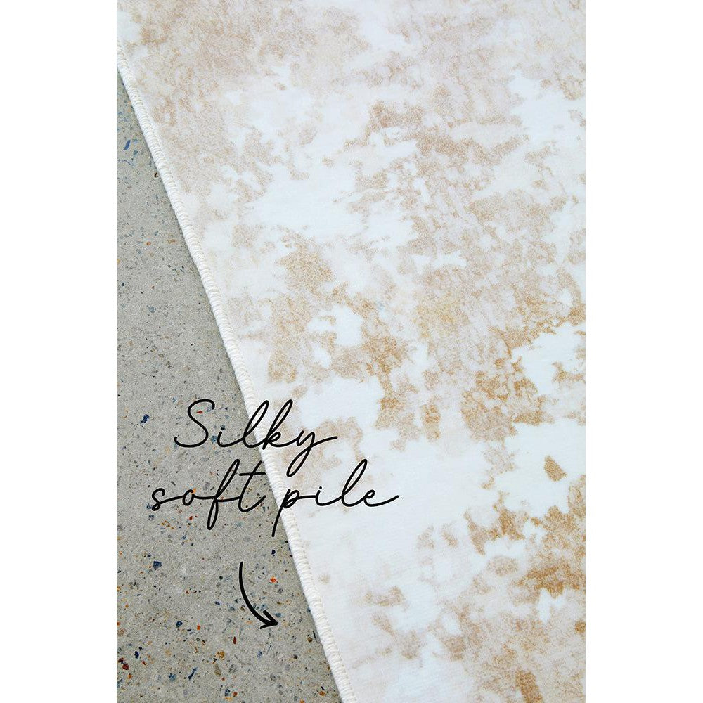 Revive Kacie Natural washable rug featuring marble-like beige and ivory pattern on cream background, hand-tufted wool