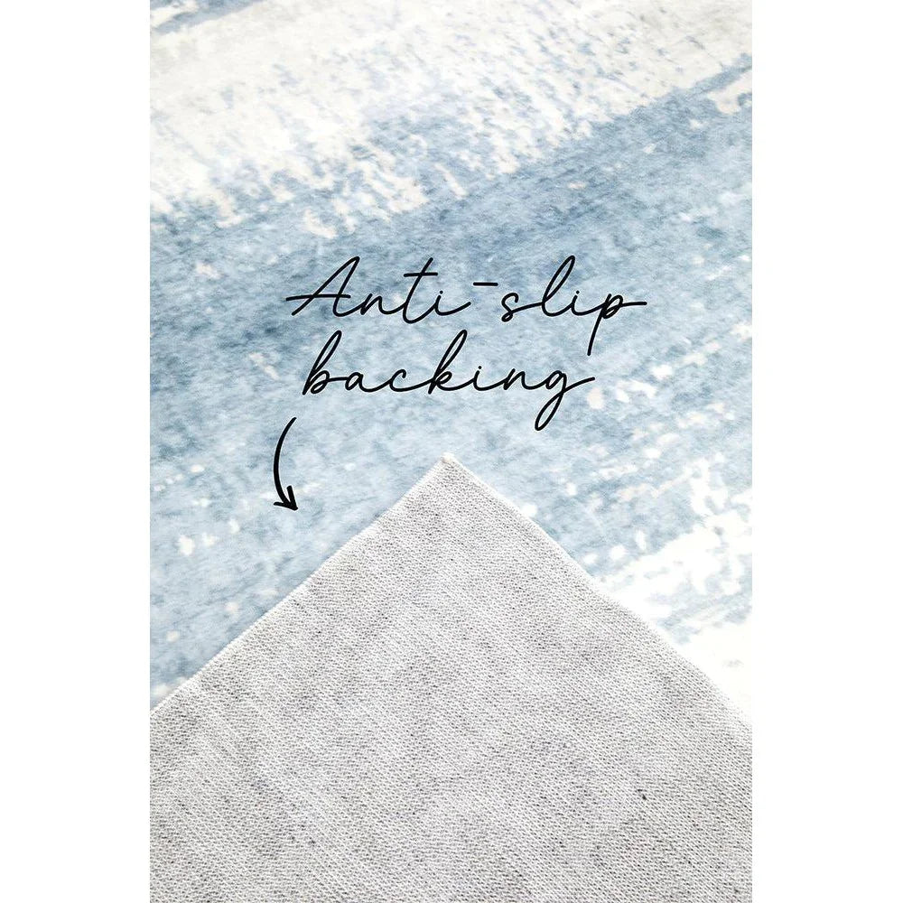 Revive Kyle Blue Washable Rug featuring blue wash pattern with cream accents and anti-slip backing, Rug Culture