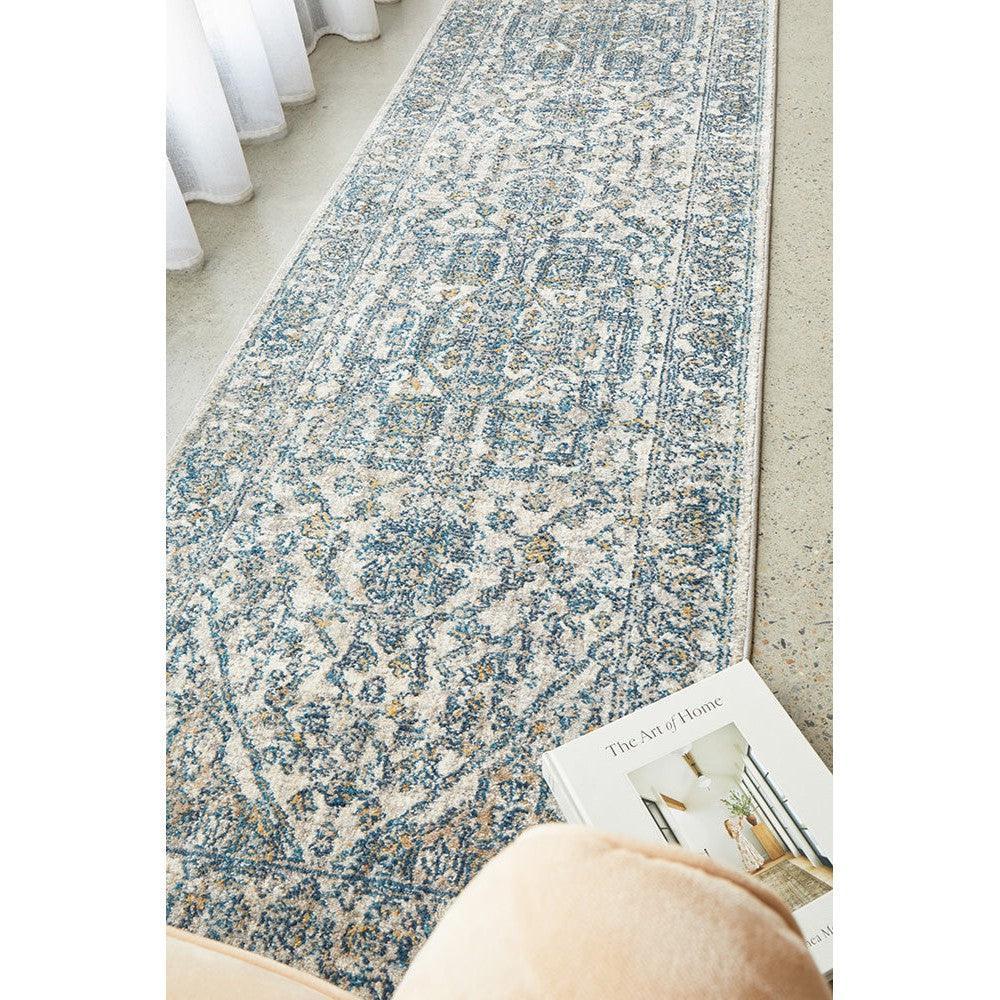 Sasha Blue Runner Rug by Rug Culture featuring ornate pattern in navy blue, sky blue and ivory on cream, machine-made polyester