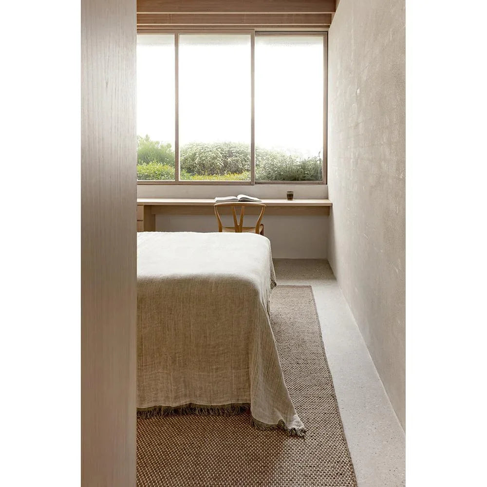 Steph And Gian Bark Walnut Rug featuring textured weave in walnut brown, beige and cream on light taupe, handwoven wool