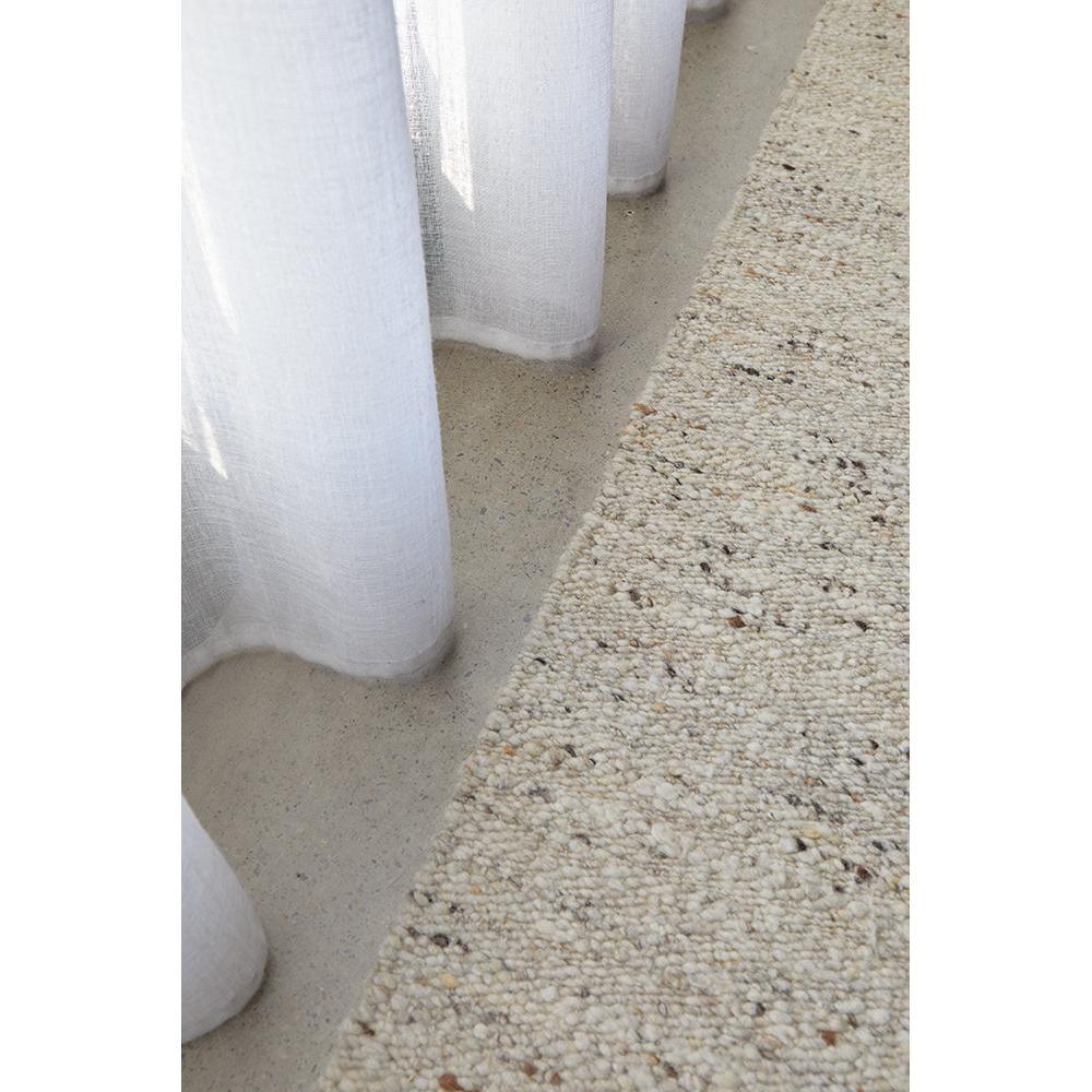 Steph And Gian Elm Pepper Rug featuring speckled pattern in cream, ivory, taupe on sand background, handtufted wool