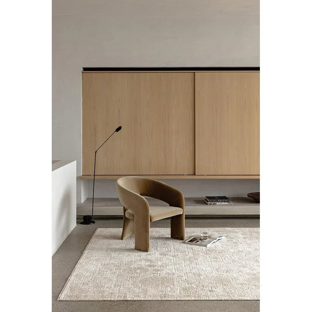 Steph And Gian Flora Husk Rug featuring textured design in cream, beige, taupe on grey floor, hand-tufted wool