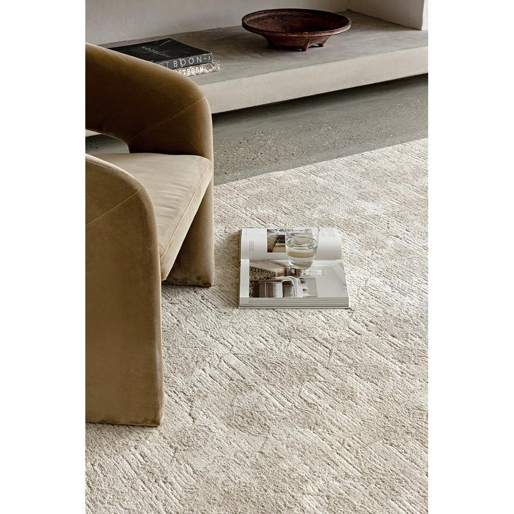 Steph And Gian Flora Husk Rug featuring delicate texture in cream, ivory and taupe on beige background, machine-woven wool