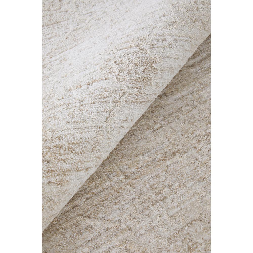Steph And Gian Flora Husk Rug featuring abstract pattern in ivory, cream and taupe on beige background, hand-tufted wool