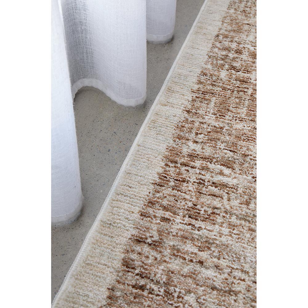 Steph And Gian Meadow Cardamom Rug featuring cream, beige and brown mottled pattern on beige, machine-made wool