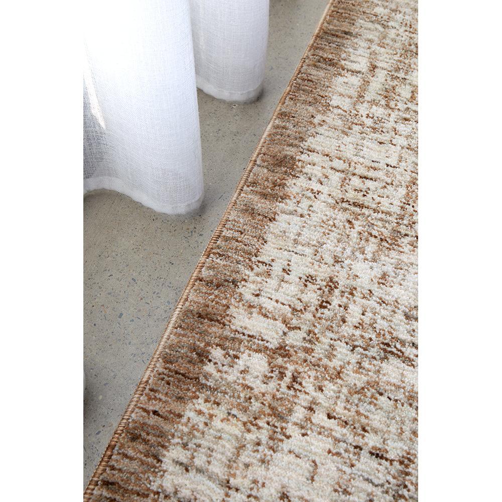 Steph And Gian Meadow Malt Runner Rug with abstract pattern in cream, beige and tan on grey bg, machine-made wool
