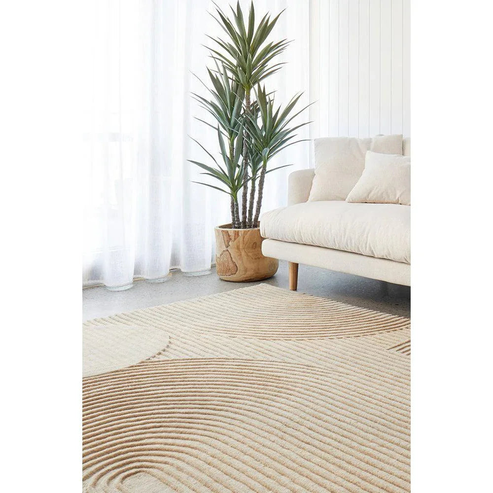 Summit Archie Beige Rug featuring circular ripple pattern in beige, cream and taupe on ivory background, machine-made wool